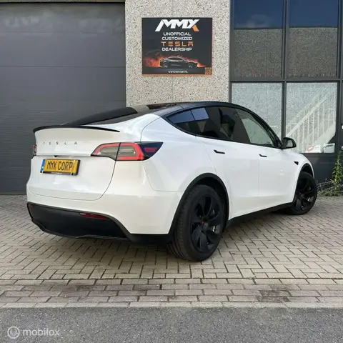 Used TESLA MODEL Y Electric 2023 Ad 