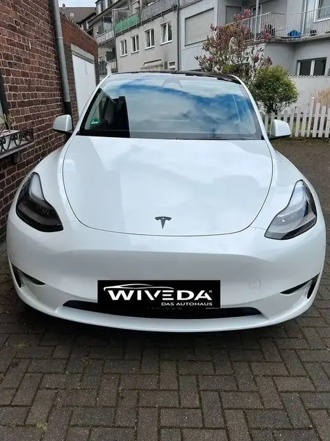 Used TESLA MODEL Y Electric 2024 Ad 