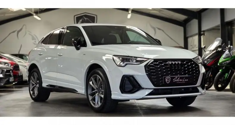 Photo 1 : Audi Q3 2023 Hybride