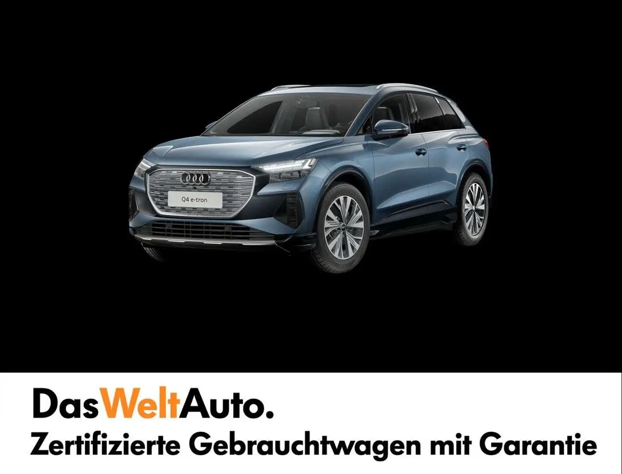 Photo 1 : Audi Q4 2024 Électrique