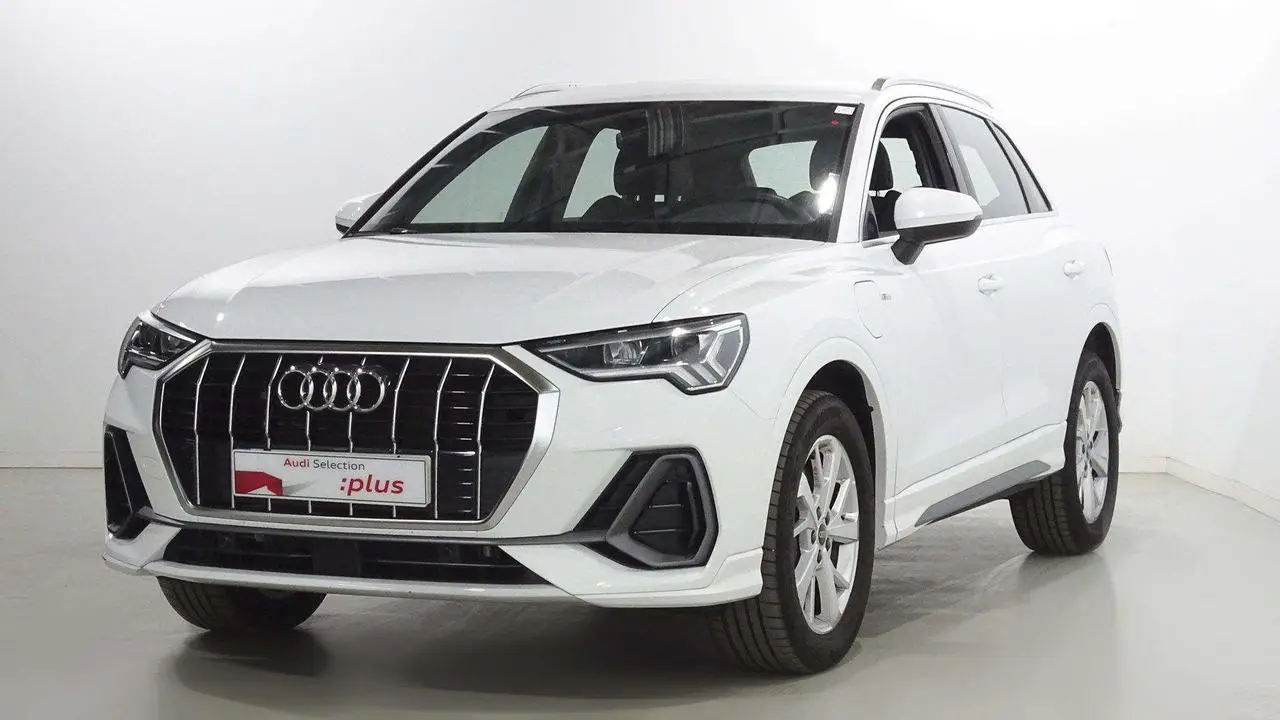 Photo 1 : Audi Q3 2023 Hybride