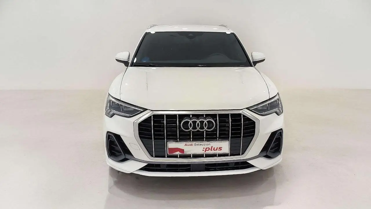 Photo 1 : Audi Q3 2023 Hybride