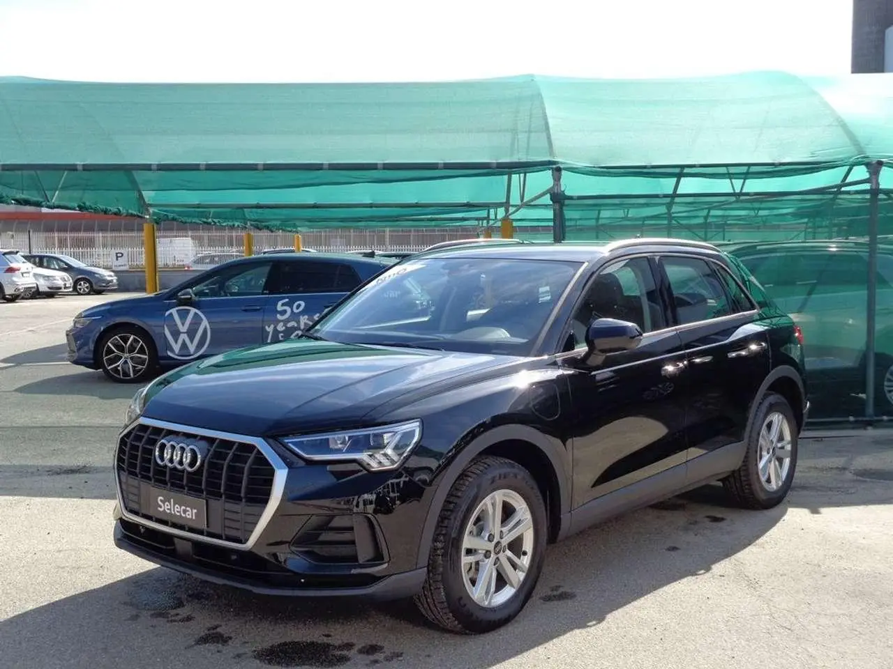 Photo 1 : Audi Q3 2024 Hybride