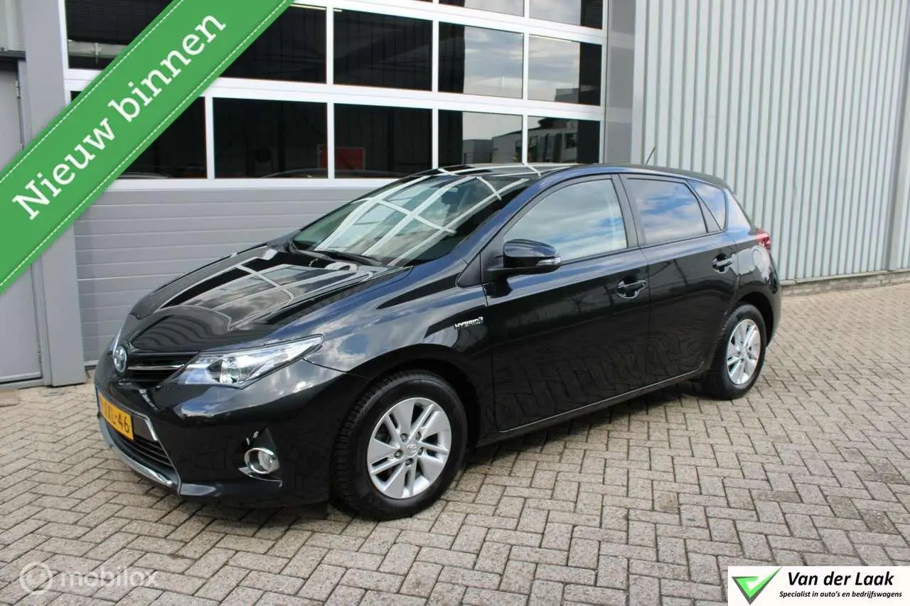 Photo 1 : Toyota Auris 2014 Hybride