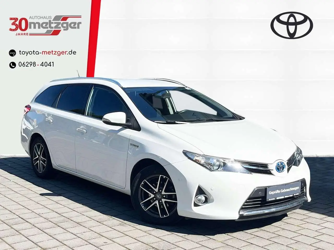 Photo 1 : Toyota Auris 2014 Hybride