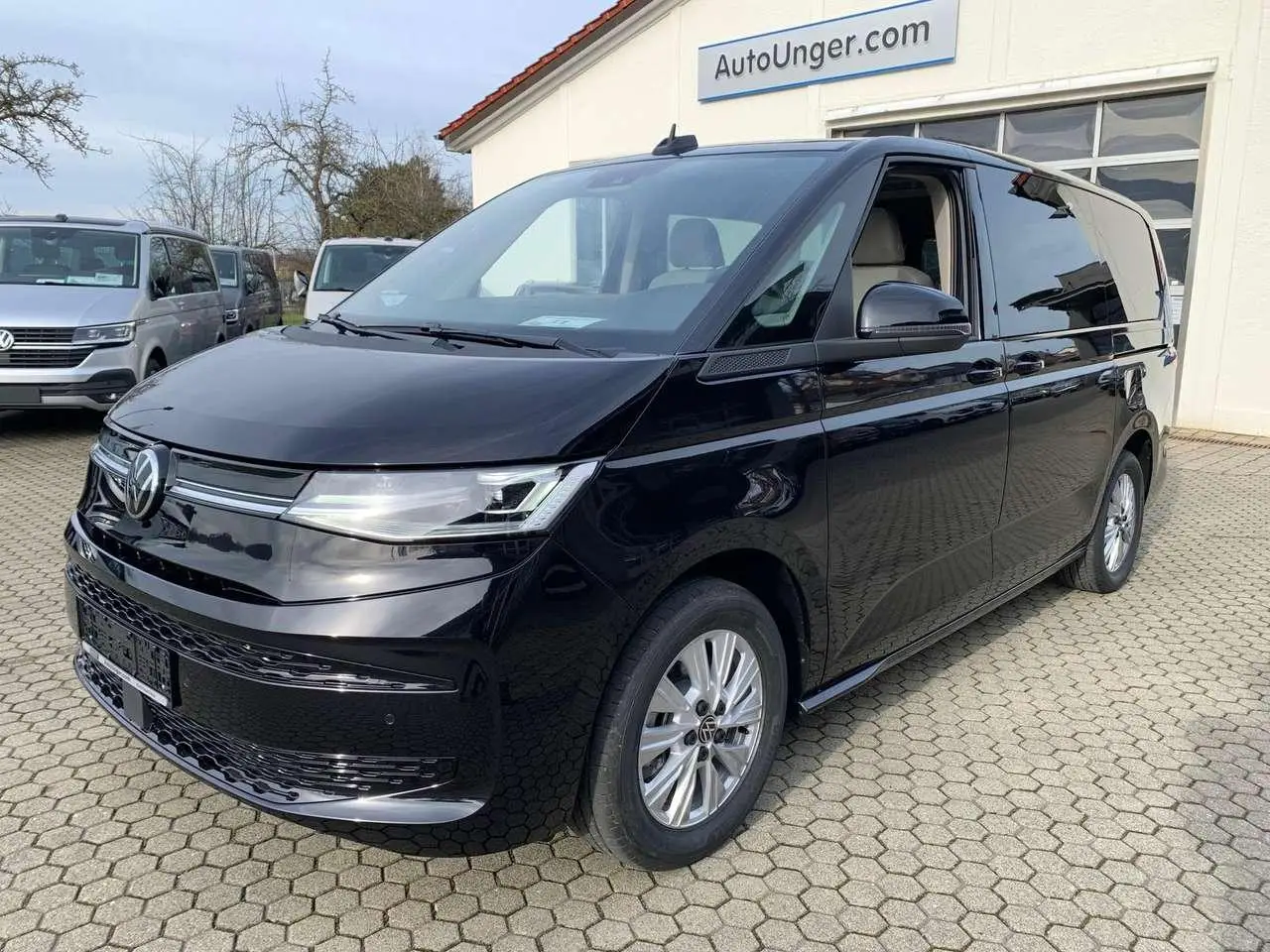 Photo 1 : Volkswagen T7 2023 Hybrid