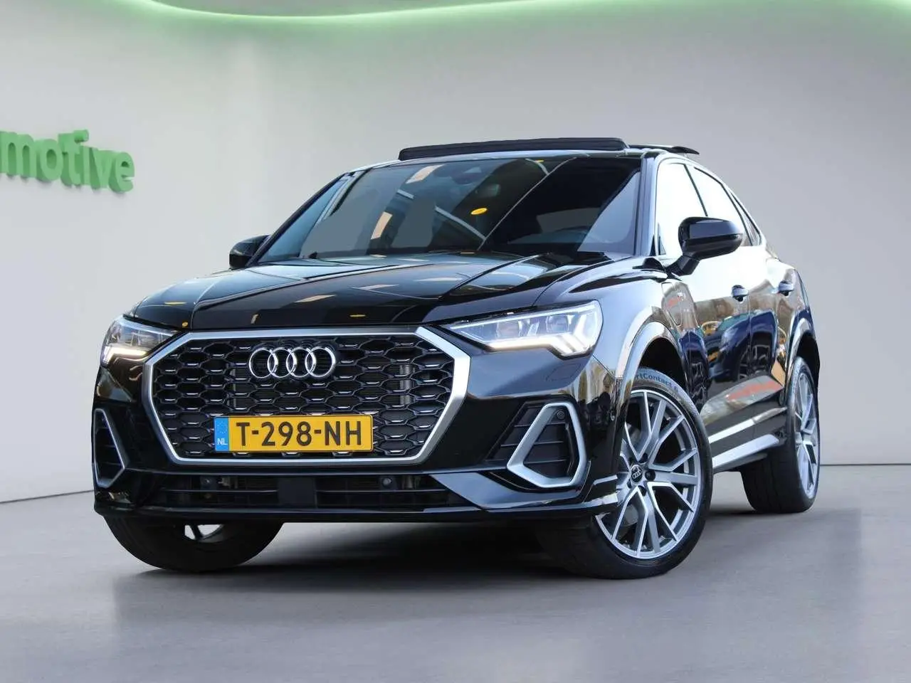 Photo 1 : Audi Q3 2023 Hybride