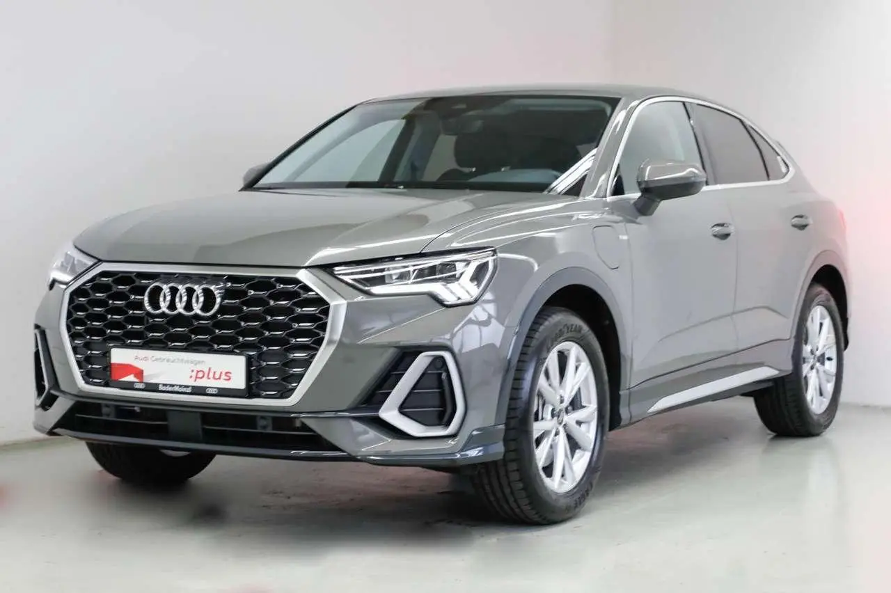 Photo 1 : Audi Q3 2023 Hybride