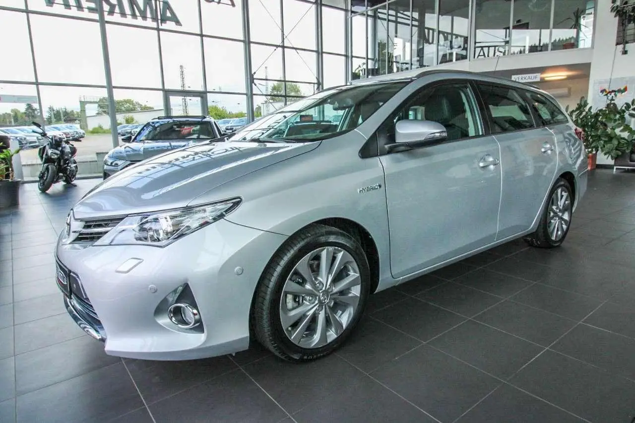 Photo 1 : Toyota Auris 2014 Hybride