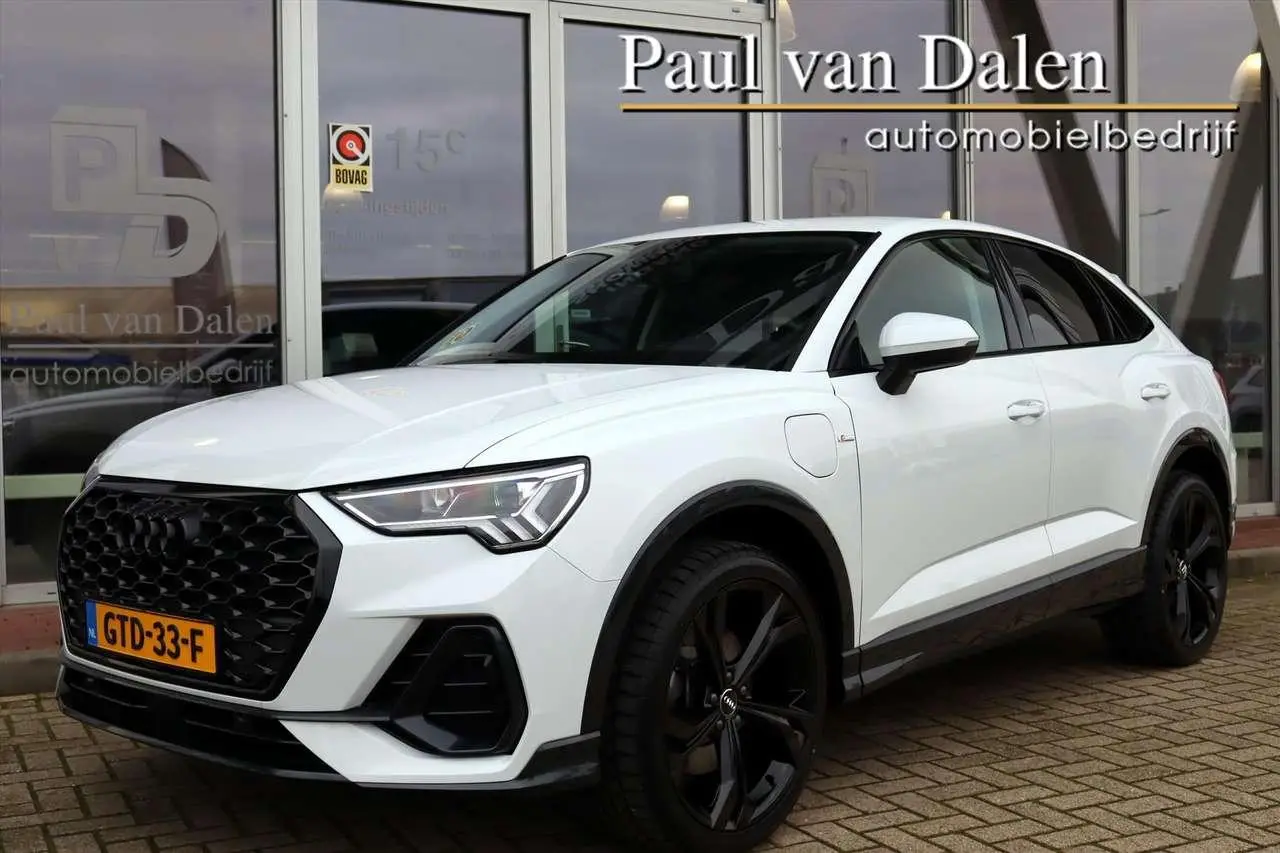 Photo 1 : Audi Q3 2023 Hybride