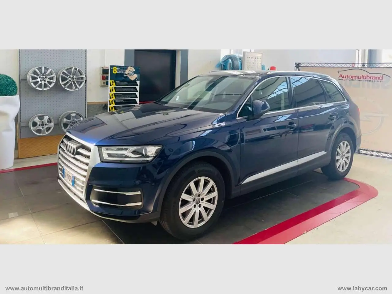 Photo 1 : Audi Q7 2019 Hybride