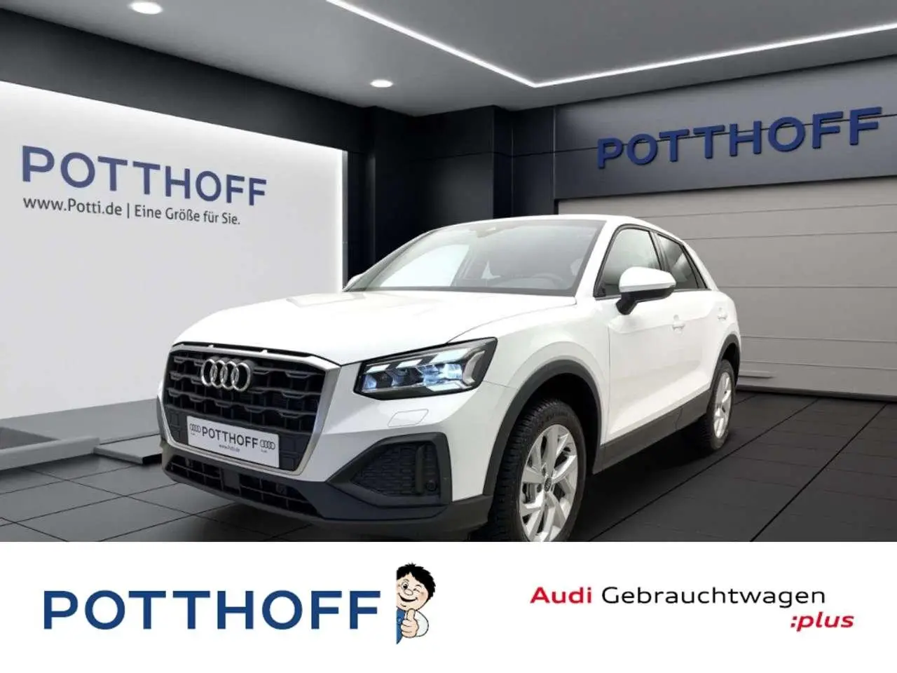 Photo 1 : Audi Q2 2024 Petrol