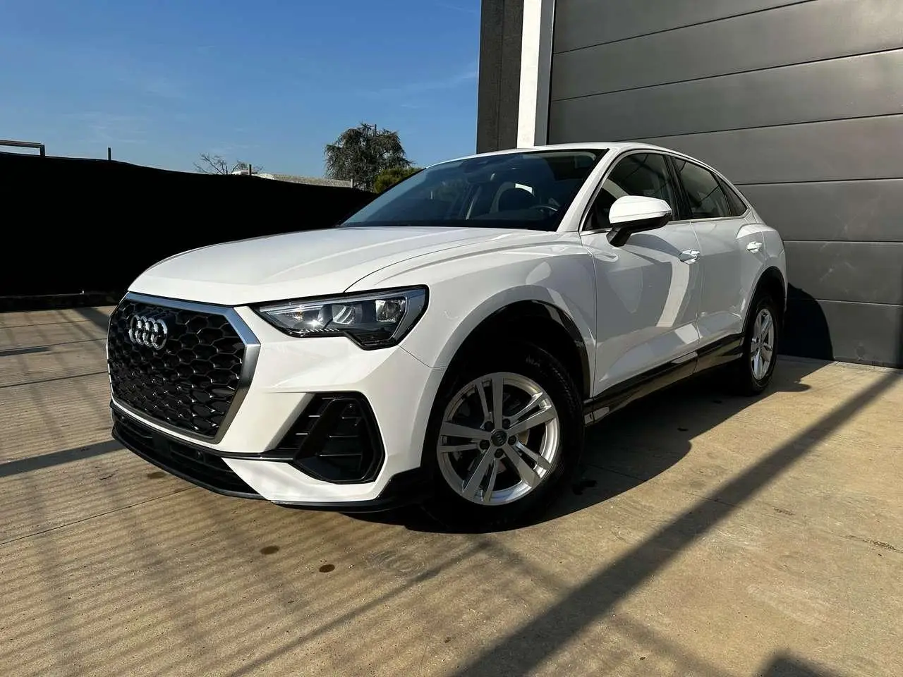 Photo 1 : Audi Q3 2020 Hybride