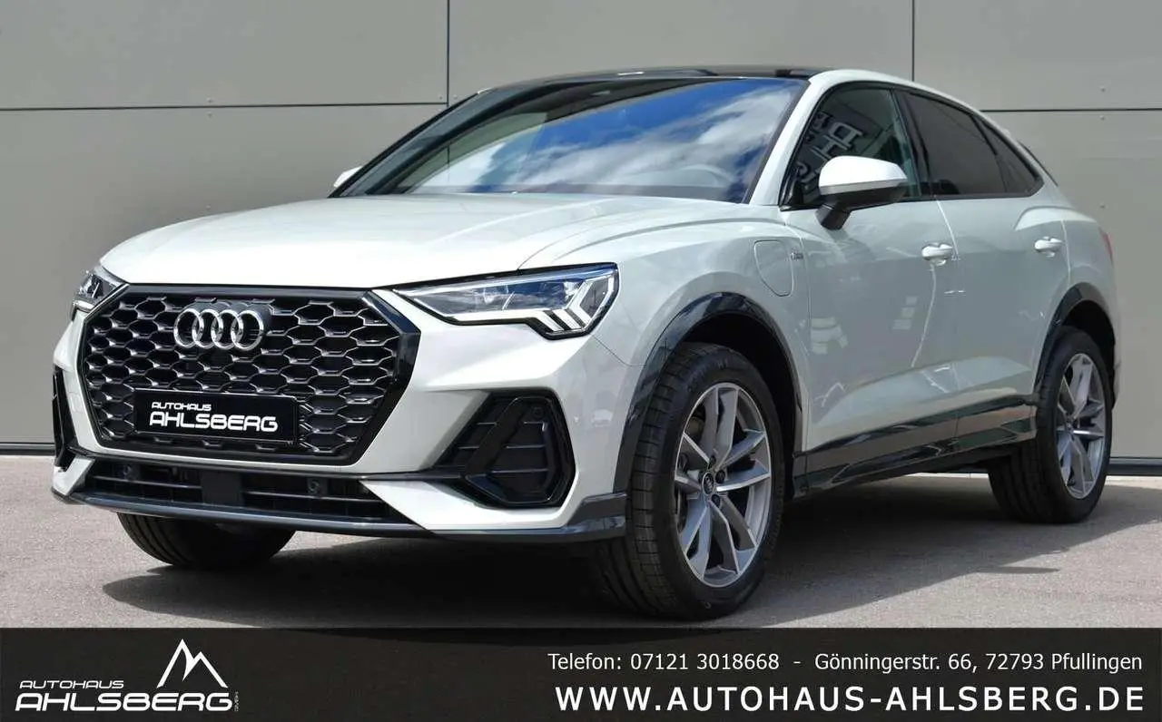 Photo 1 : Audi Q3 2023 Hybride