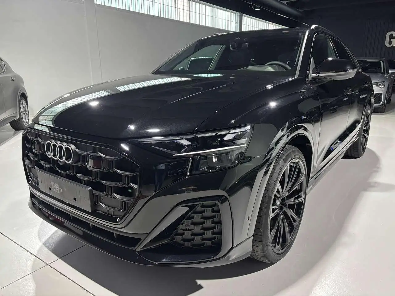 Photo 1 : Audi Q8 2024 Hybride