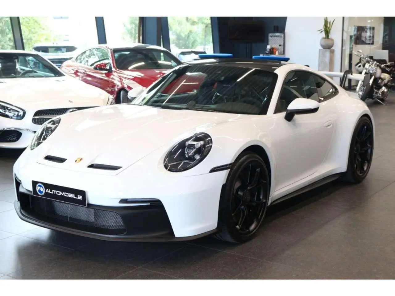 Photo 1 : Porsche 992 2023 Petrol