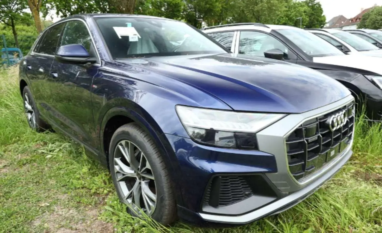 Photo 1 : Audi Q8 2023 Hybride