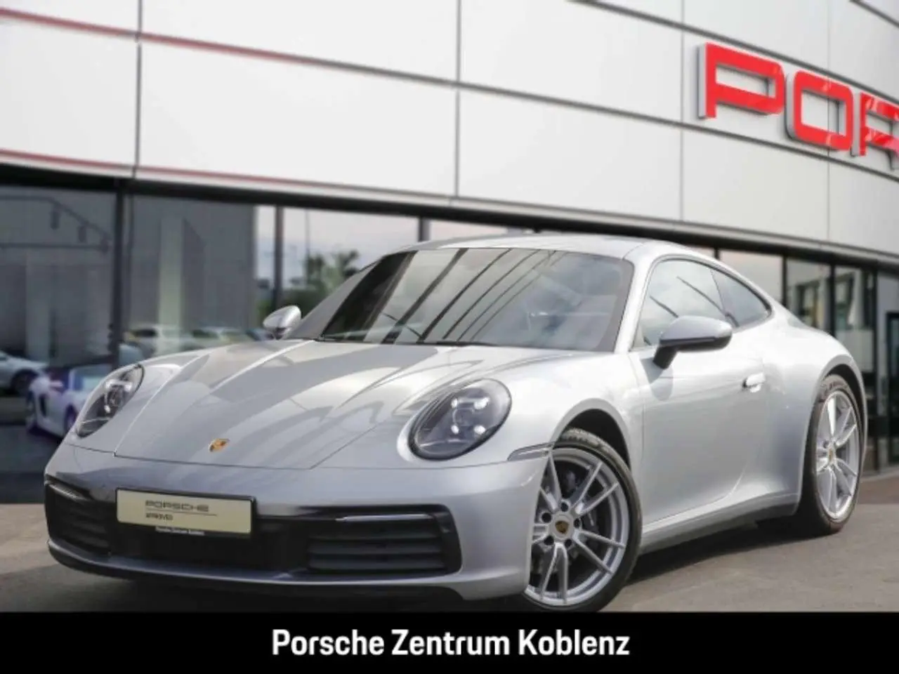 Photo 1 : Porsche 992 2021 Petrol