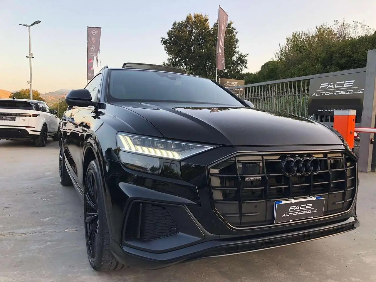 Photo 1 : Audi Q8 2023 Hybride