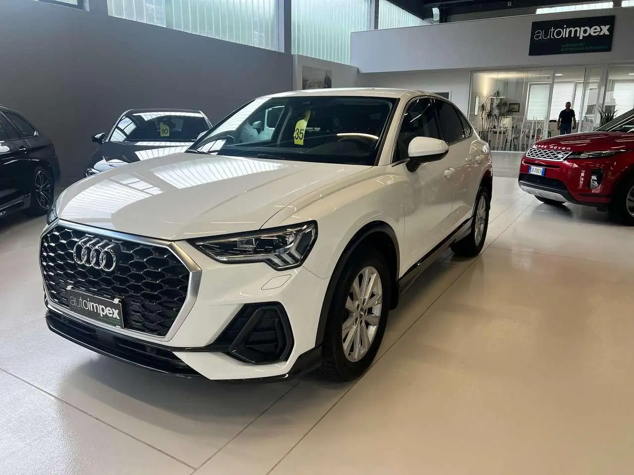 Photo 1 : Audi Q3 2020 Hybride