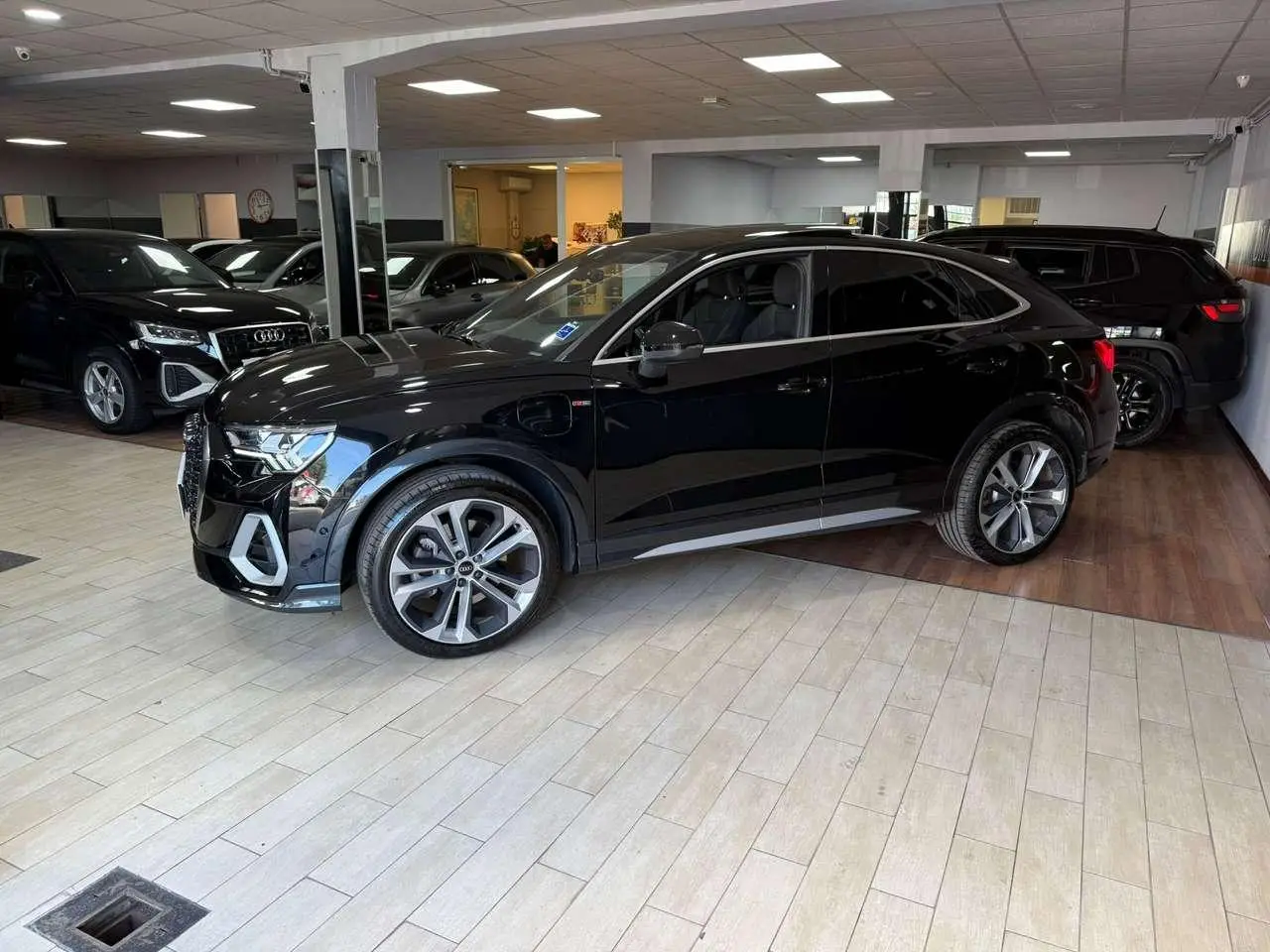 Photo 1 : Audi Q3 2021 Hybride