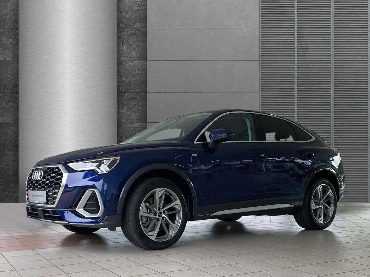 Photo 1 : Audi Q3 2023 Hybride