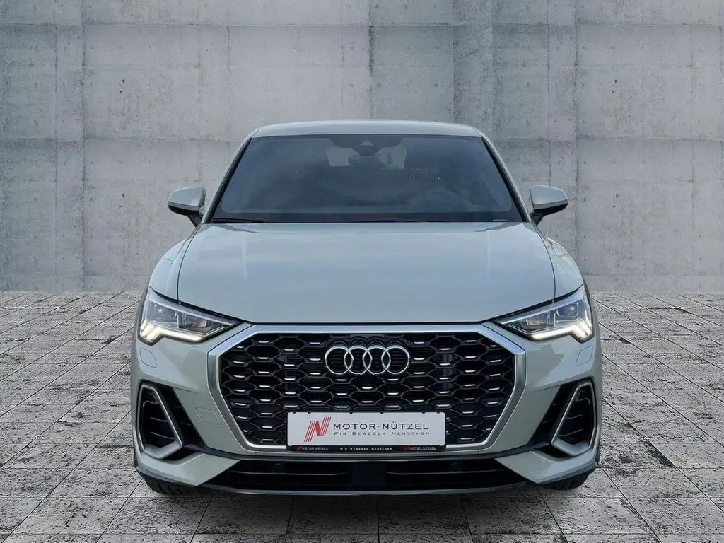 Photo 1 : Audi Q3 2024 Hybride