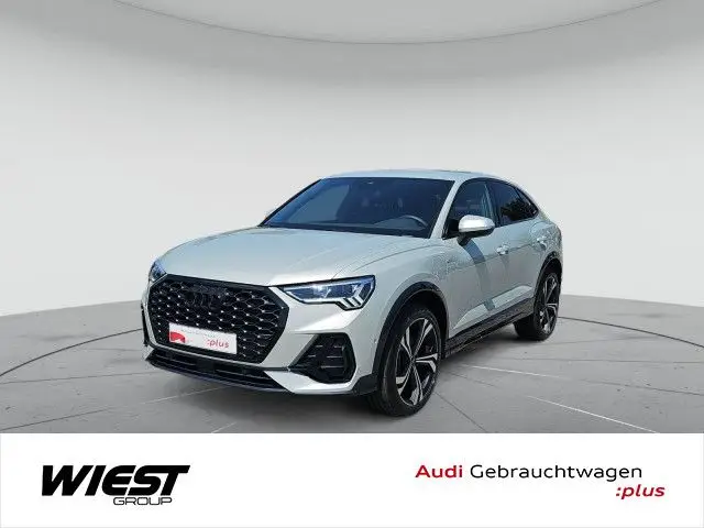 Photo 1 : Audi Q3 2023 Hybride