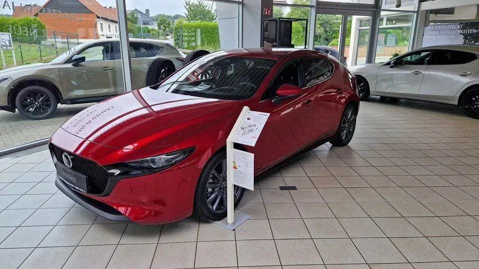 Photo 1 : Mazda 3 2024 Hybrid