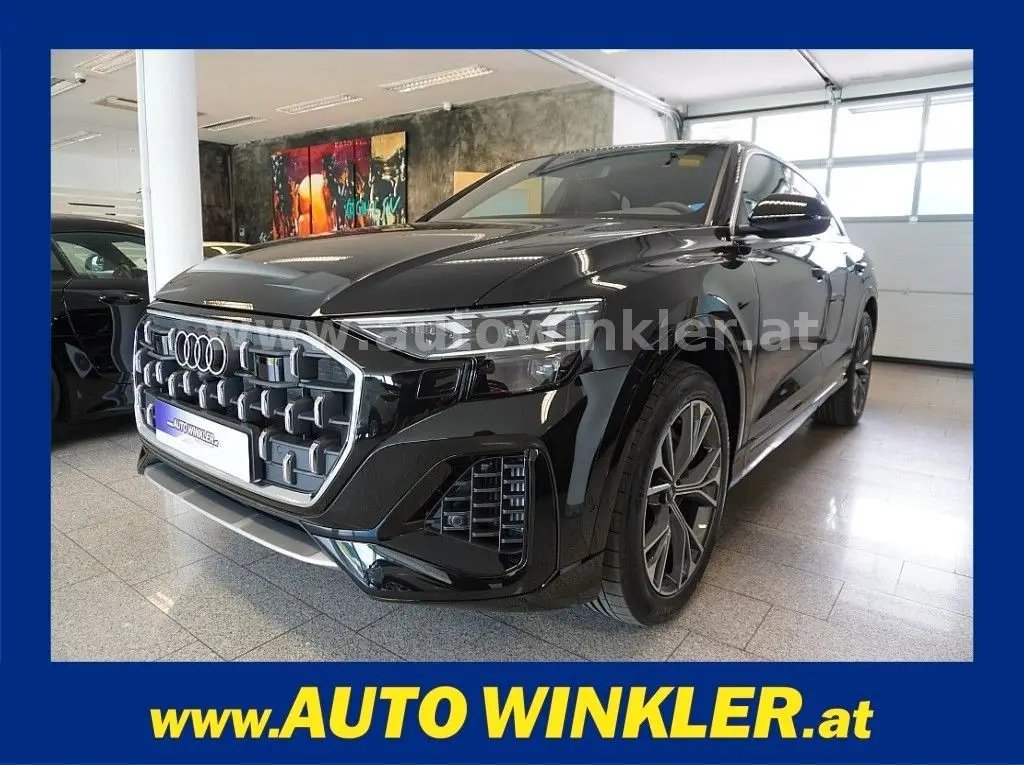 Photo 1 : Audi Q8 2024 Hybrid