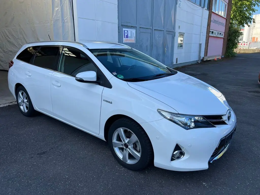 Photo 1 : Toyota Auris 2014 Hybride