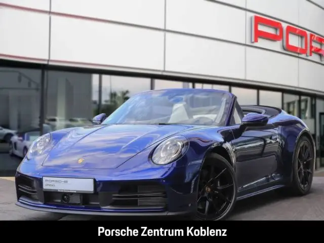 Photo 1 : Porsche 992 2024 Petrol