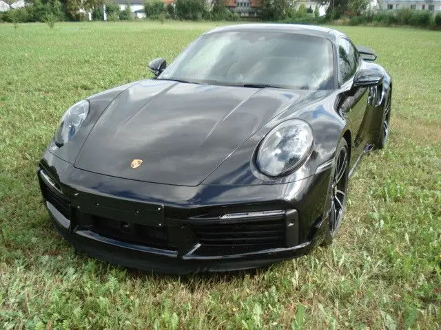 Photo 1 : Porsche 992 2024 Petrol