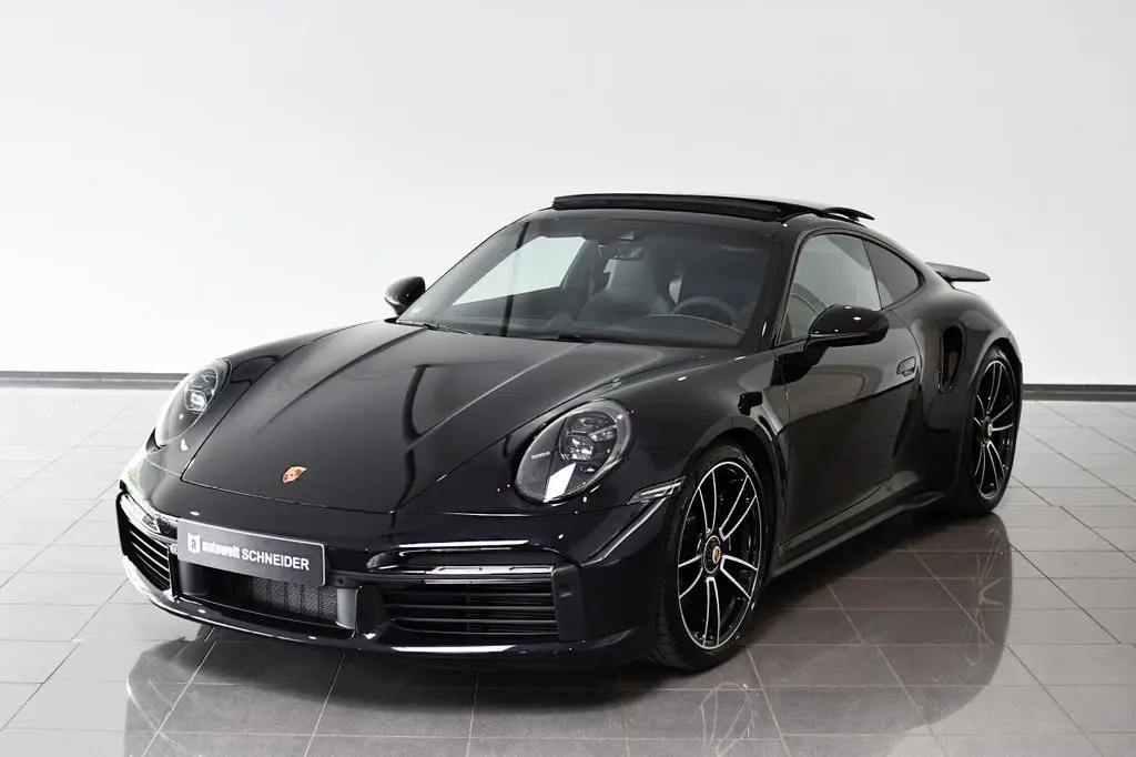 Photo 1 : Porsche 992 2021 Petrol