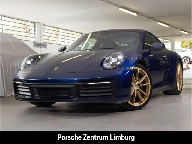 Photo 1 : Porsche 992 2024 Petrol