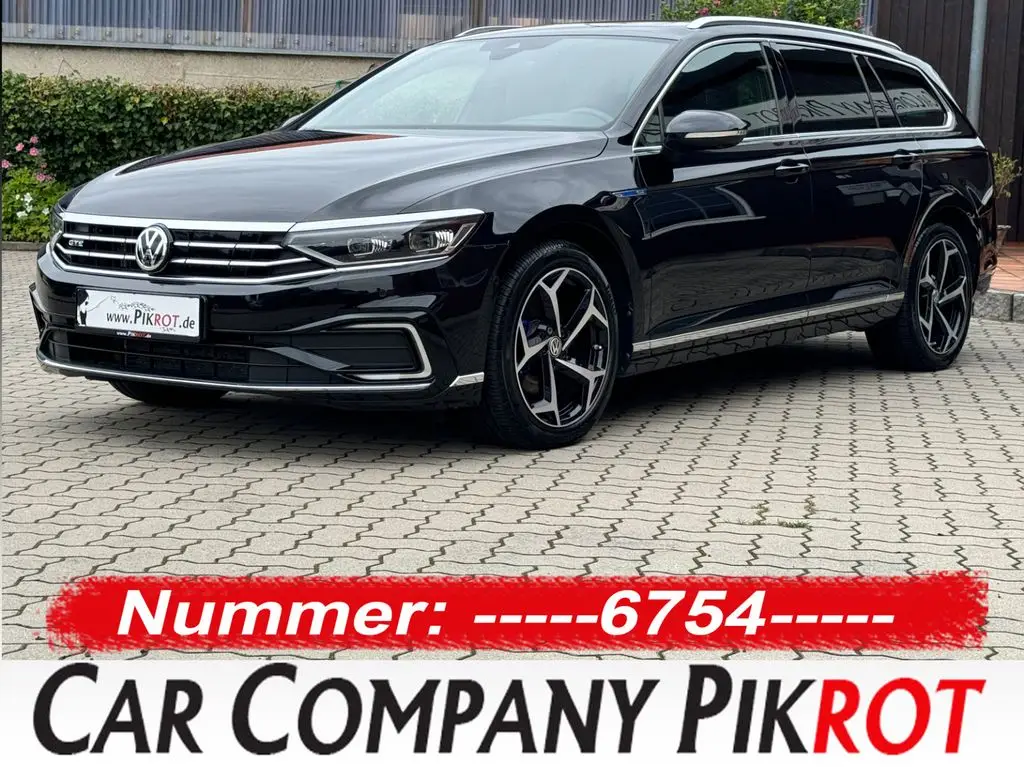 Photo 1 : Volkswagen Passat 2019 Hybride