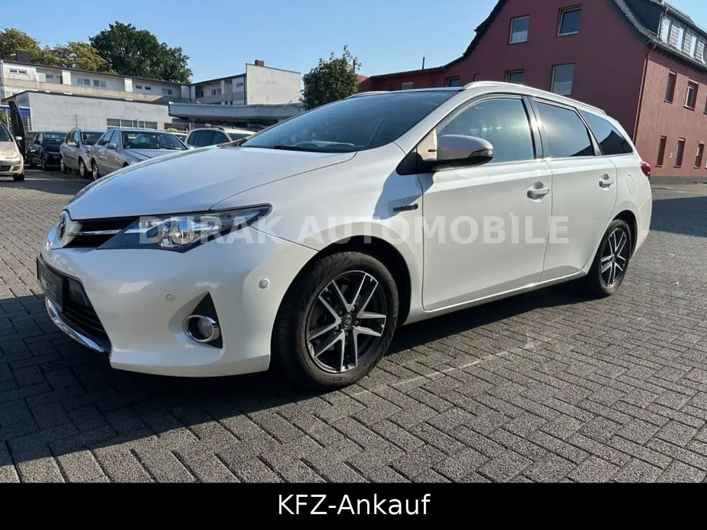 Photo 1 : Toyota Auris 2015 Hybride