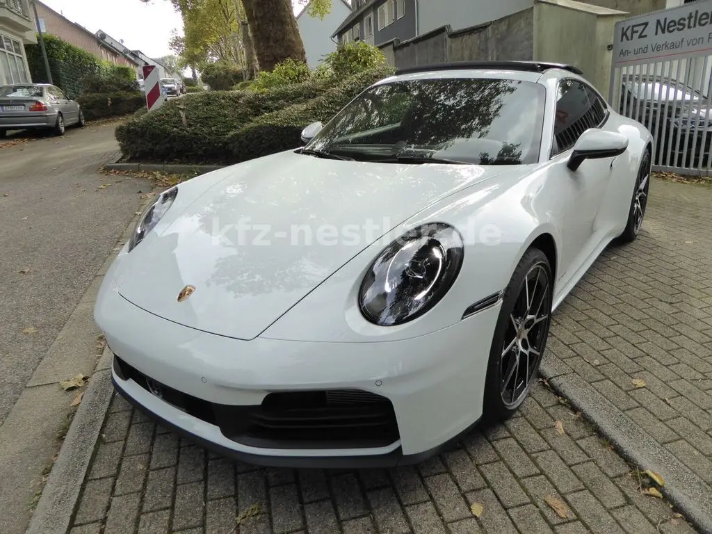 Photo 1 : Porsche 992 2024 Petrol