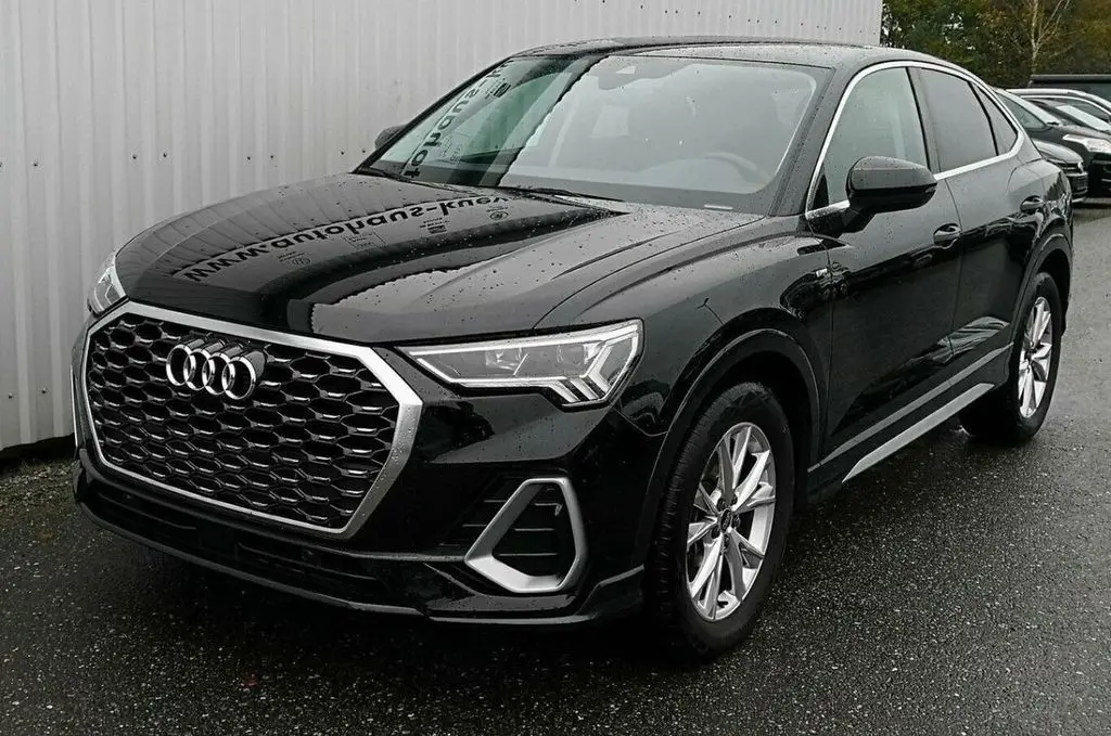 Photo 1 : Audi Q3 2023 Hybride