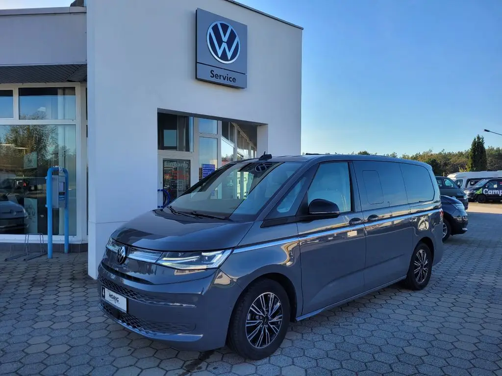 Photo 1 : Volkswagen T7 2023 Hybride