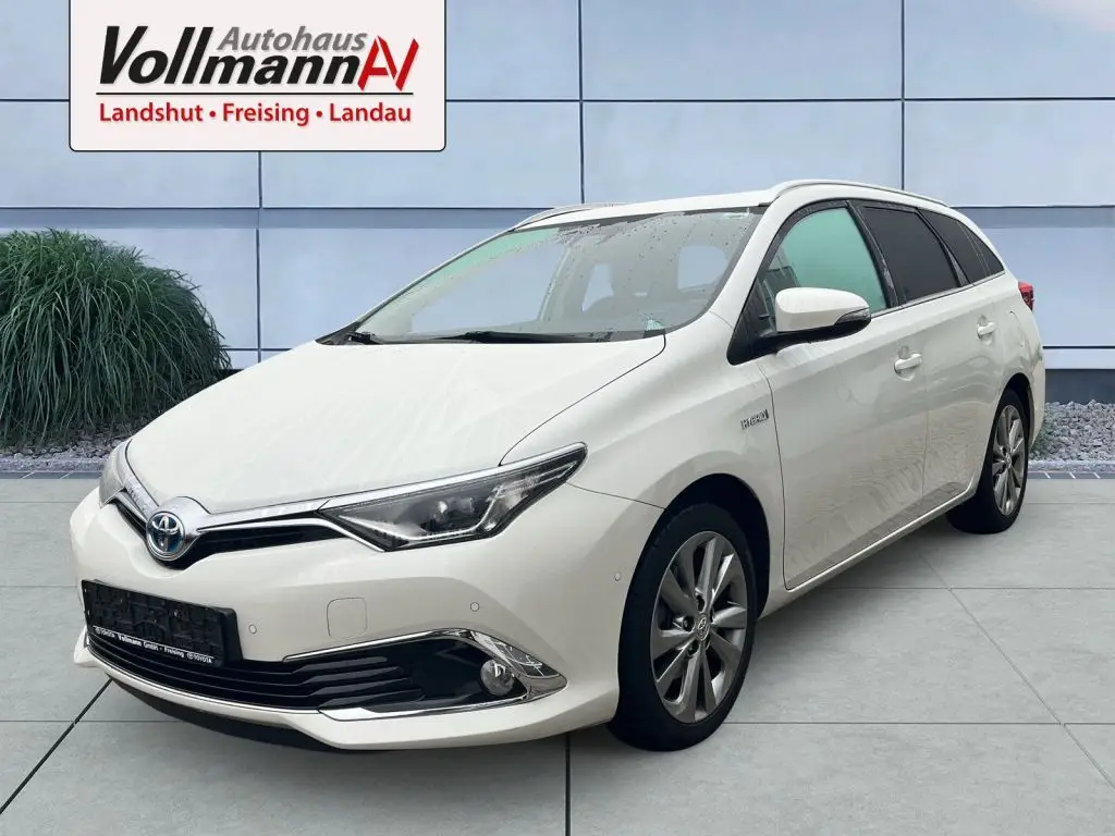 Photo 1 : Toyota Auris 2016 Hybride