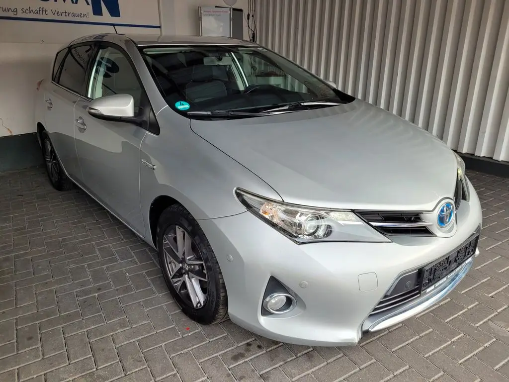 Photo 1 : Toyota Auris 2015 Hybride