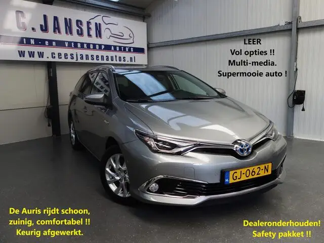 Photo 1 : Toyota Auris 2015 Hybride