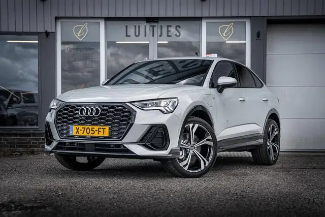 Photo 1 : Audi Q3 2023 Hybride