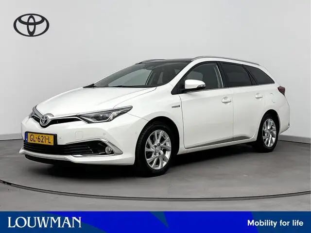 Photo 1 : Toyota Auris 2015 Hybride