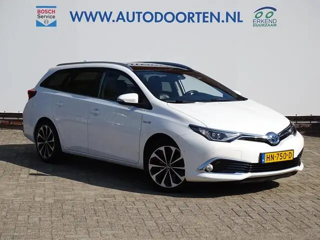 Photo 1 : Toyota Auris 2015 Hybride