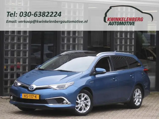 Photo 1 : Toyota Auris 2015 Hybrid